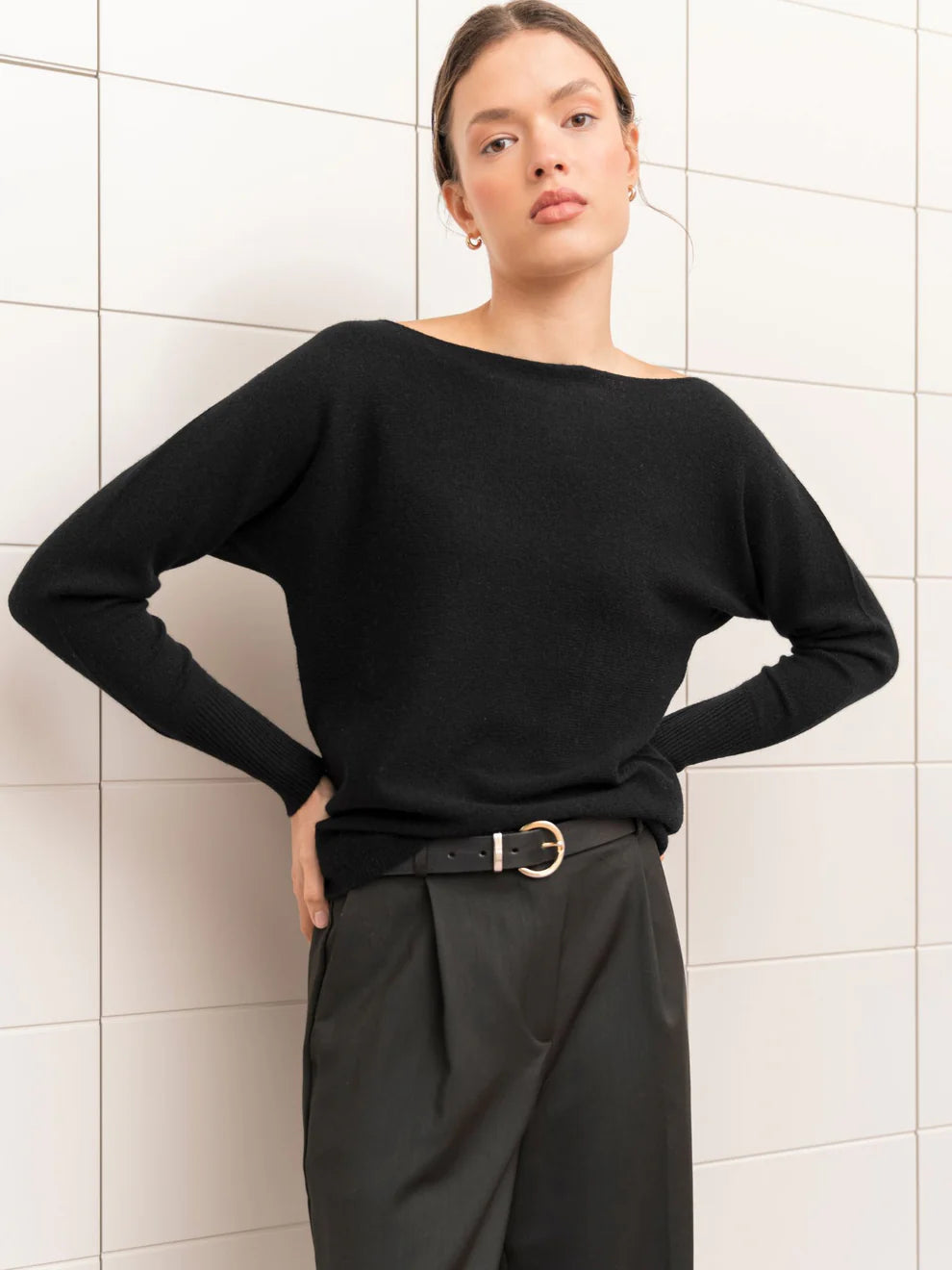 Claudia neulepusero, musta